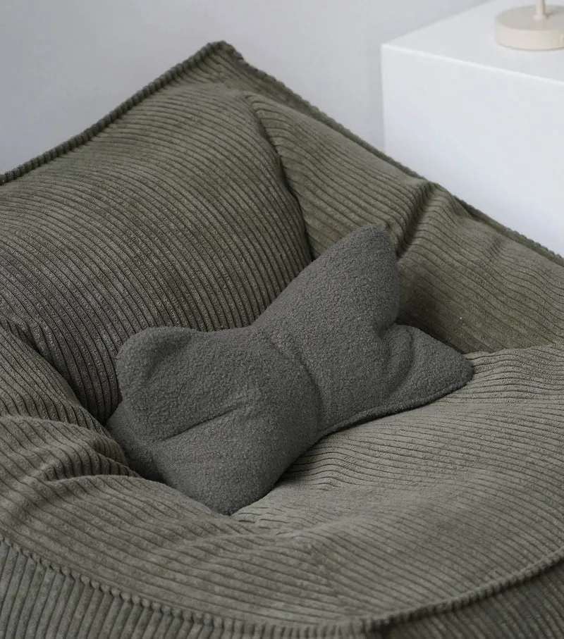 Nackenkissen in Bouclé & Cord ‘Der Leseknochen'