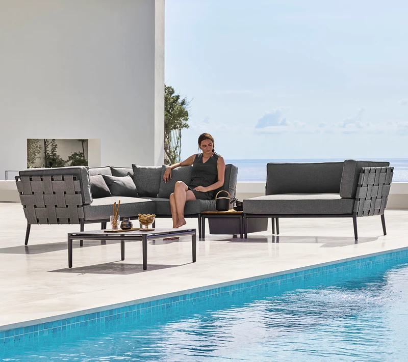 Conic modular corner sofa with box table