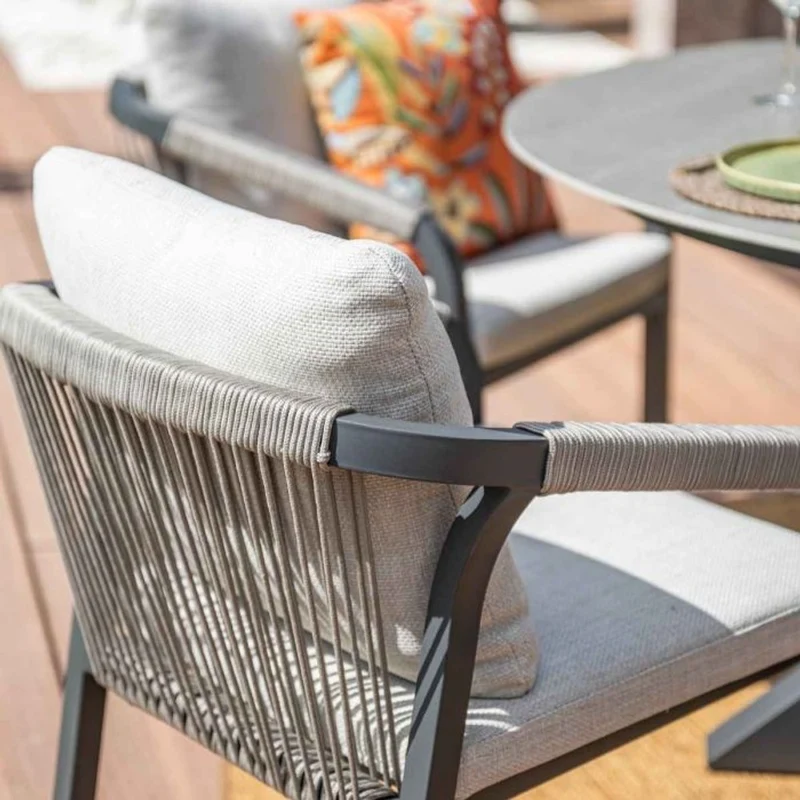 Monti tuinset 6-delig carbon black rope taupe met Lowland tuintafel rond 150 cm napoli sand