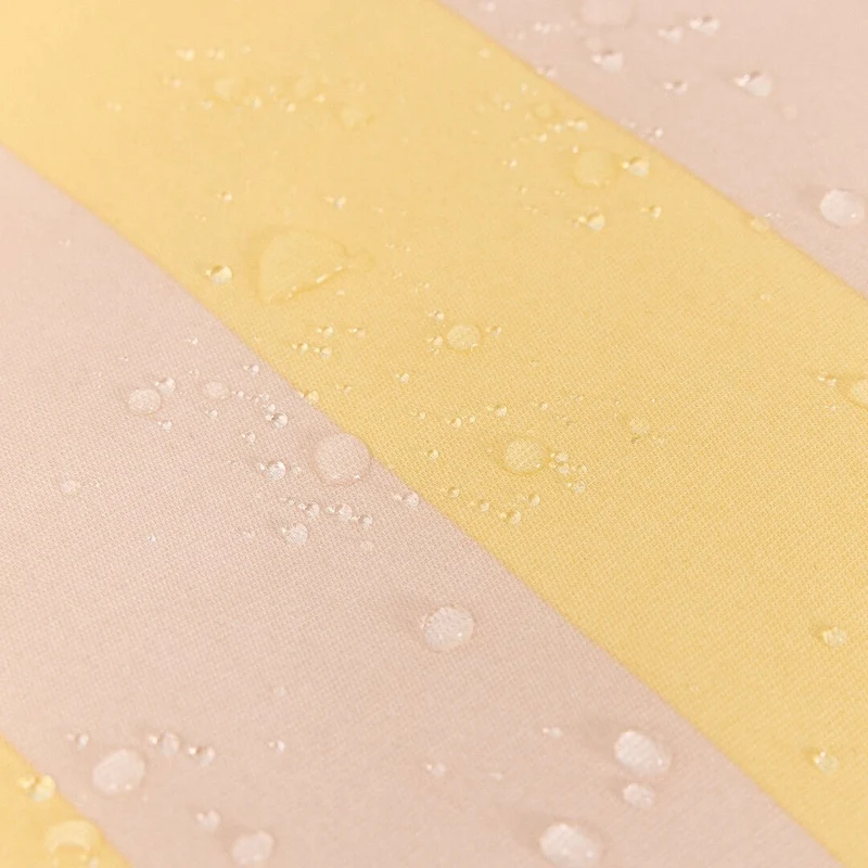 Pouf d'extérieur pour enfant en tissu déperlant à rayures jaune et rose 68 x 40 x 60 cm Vibes - Nobodinoz