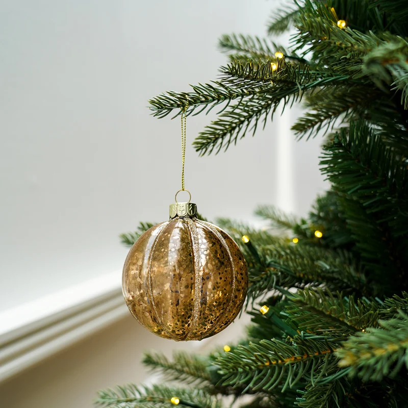 Glaskugel mit Glitzerstreifen
