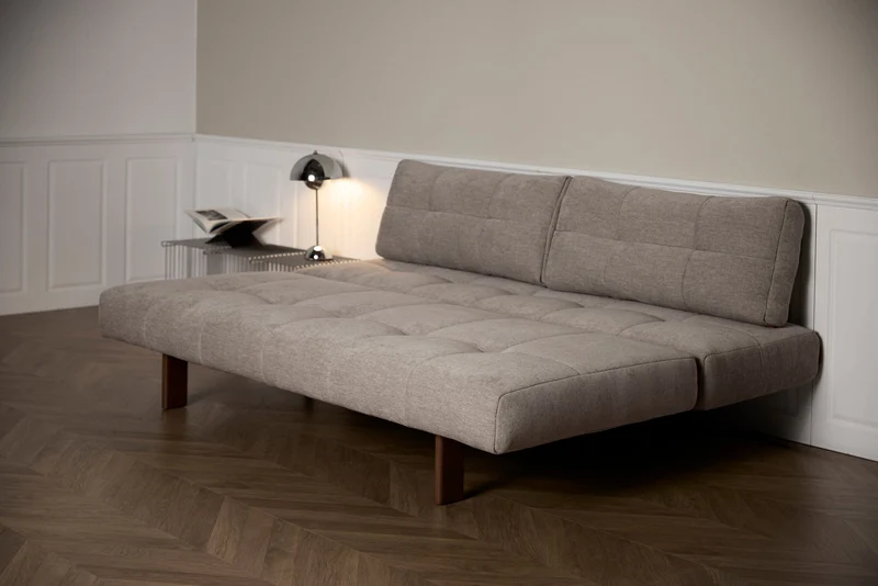 Canapé convertible en polyester beige et pied en chêne foncé 202x65cm Eilis - Innovation Living