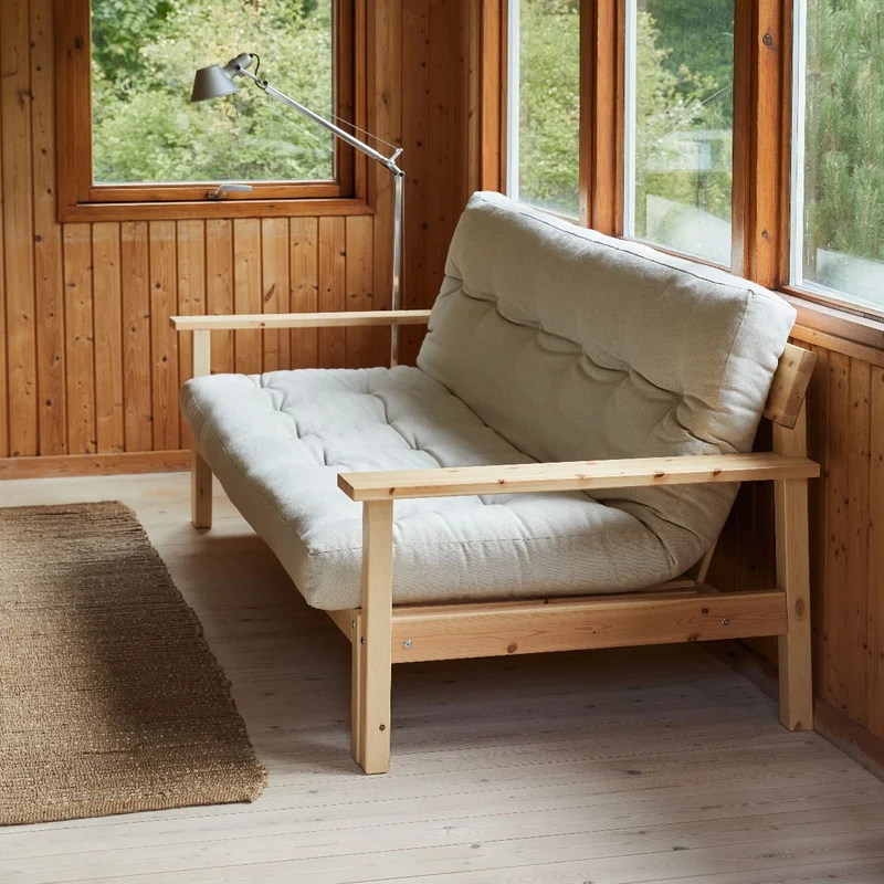 Canapé-lit en pin massif avec accoudoirs et matelas en coton marron 130x190cm Unwind - Karup Design