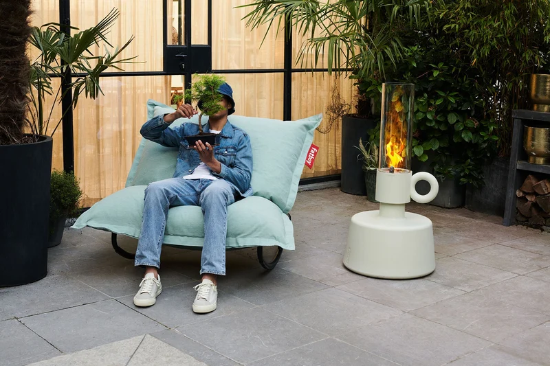 Fauteuil à bascule extérieur en métal noir avec coussin rayé marron cacao crème Rock 'n Roll Combi - Fatboy