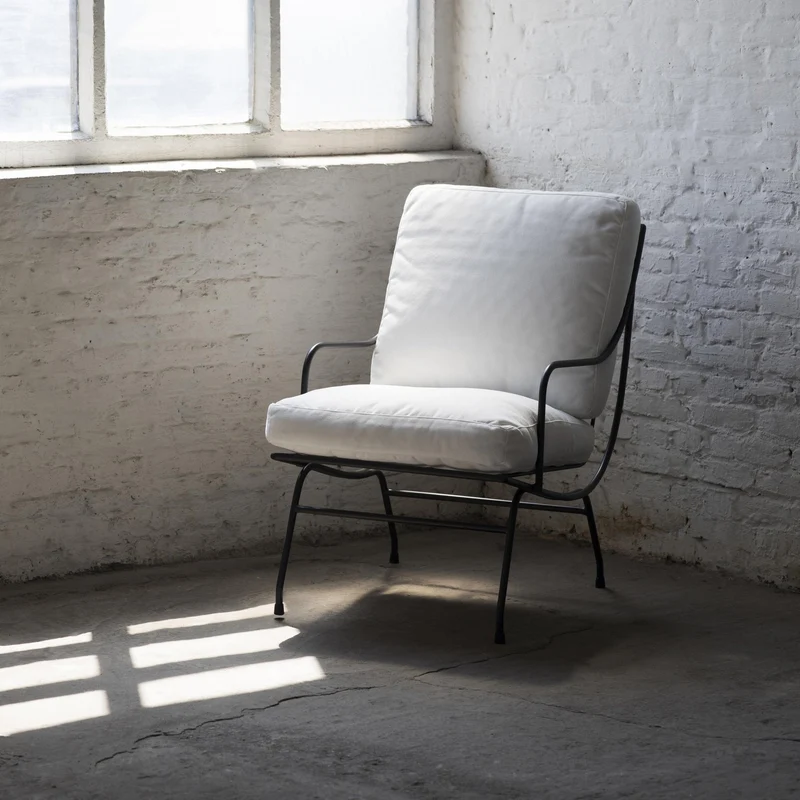 Fauteuil en acier noir avec coussin Stresa - Serax