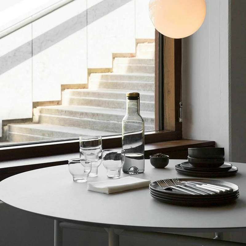 Table à manger ronde en chêne noir 120 cm Snaregade - Audo